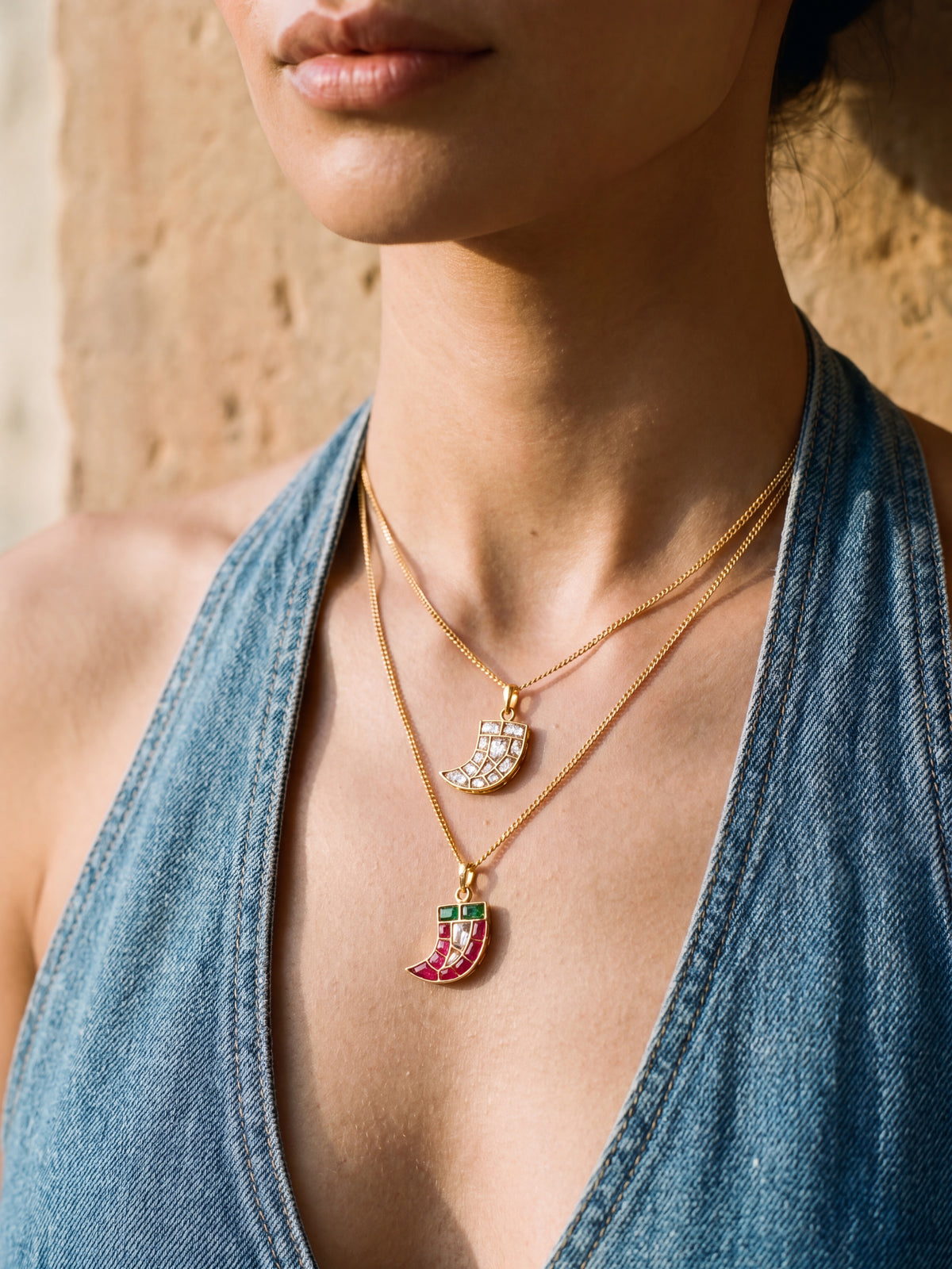 Jadau Kundan tiger-claw pendant on a gold curb chain, white or multicolour