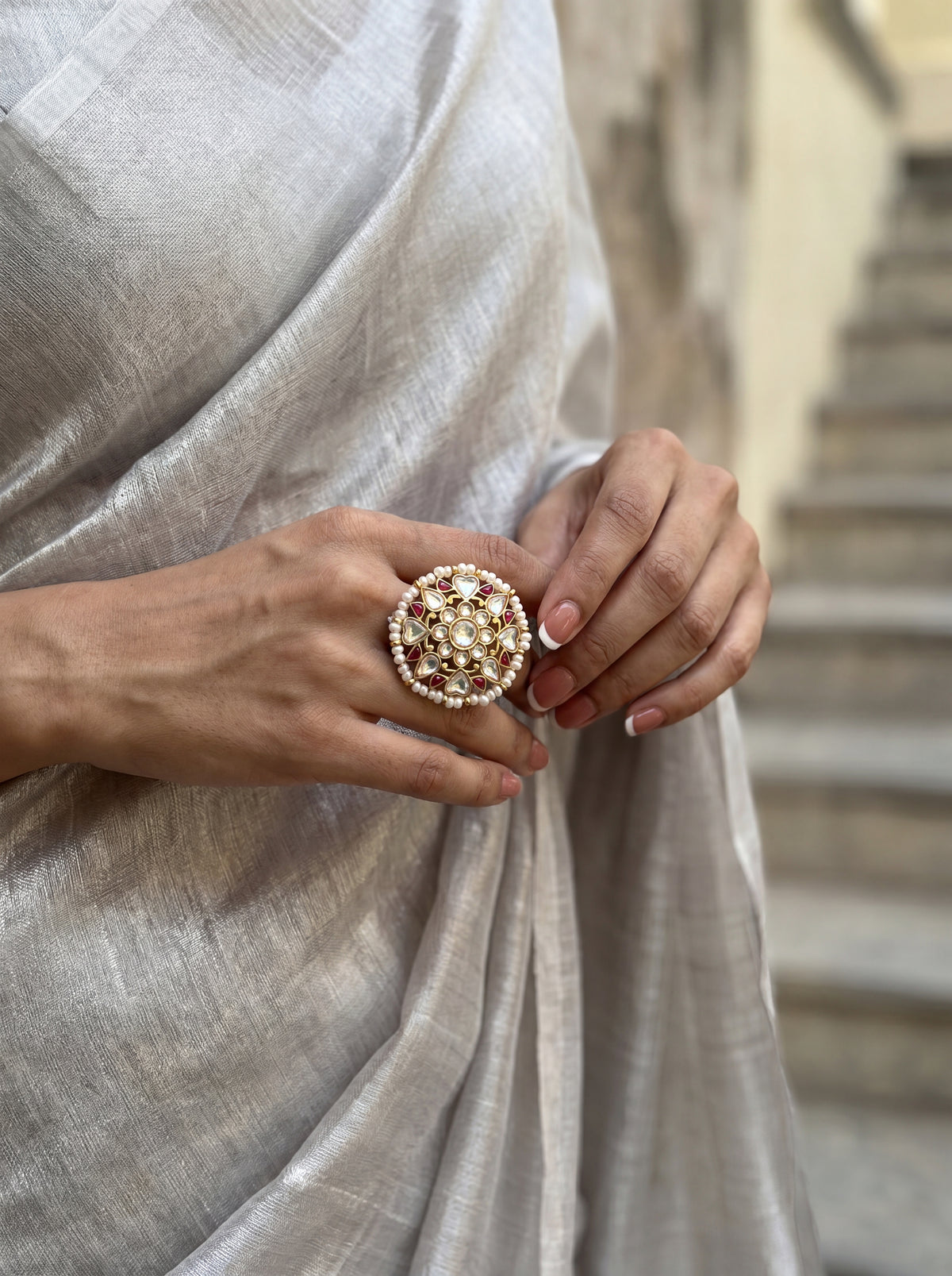 Jadau Kundan cocktail ring with a polki mandala and ruby accents