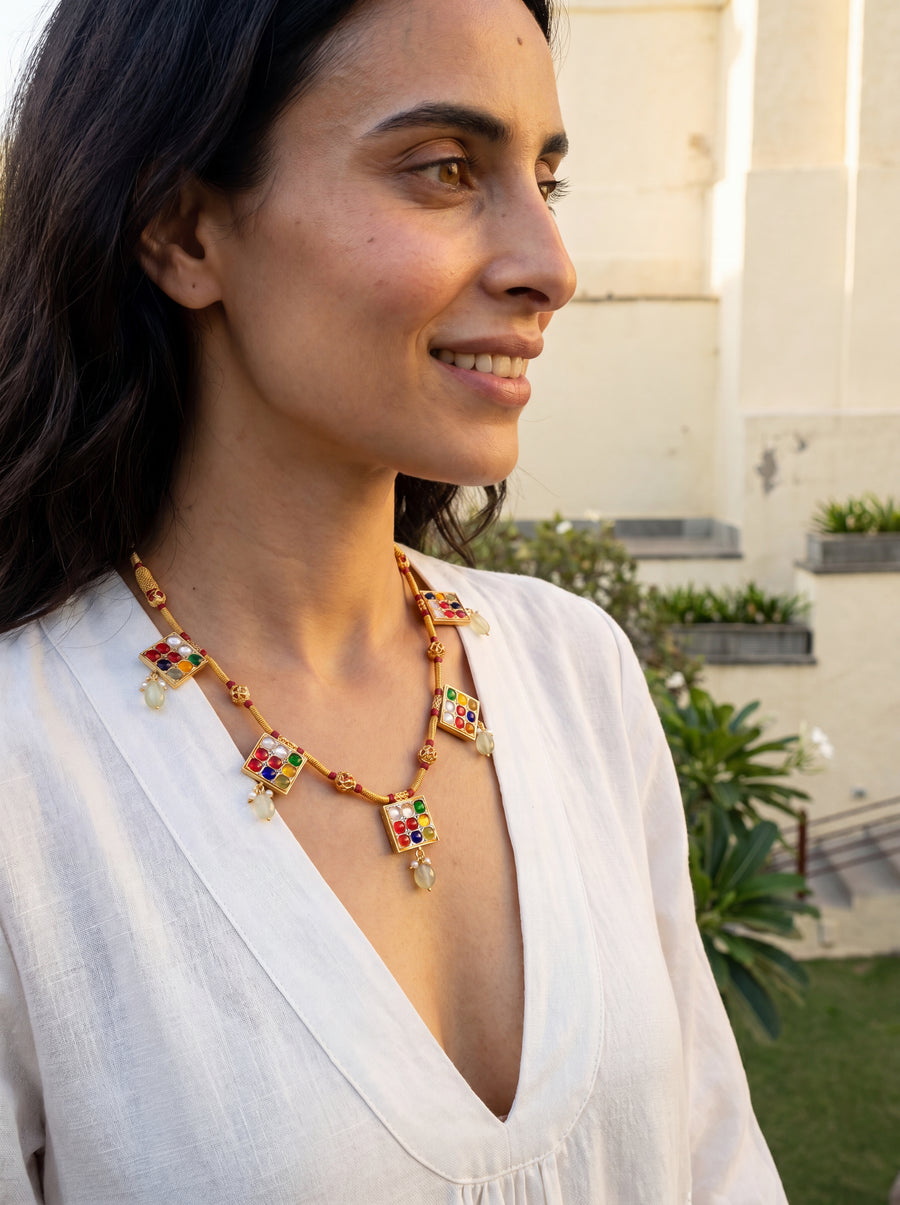 Navratna necklace set with nine semi-precious stones and jade drops