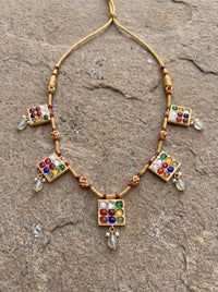 Navratna necklace set with nine semi-precious stones and jade drops