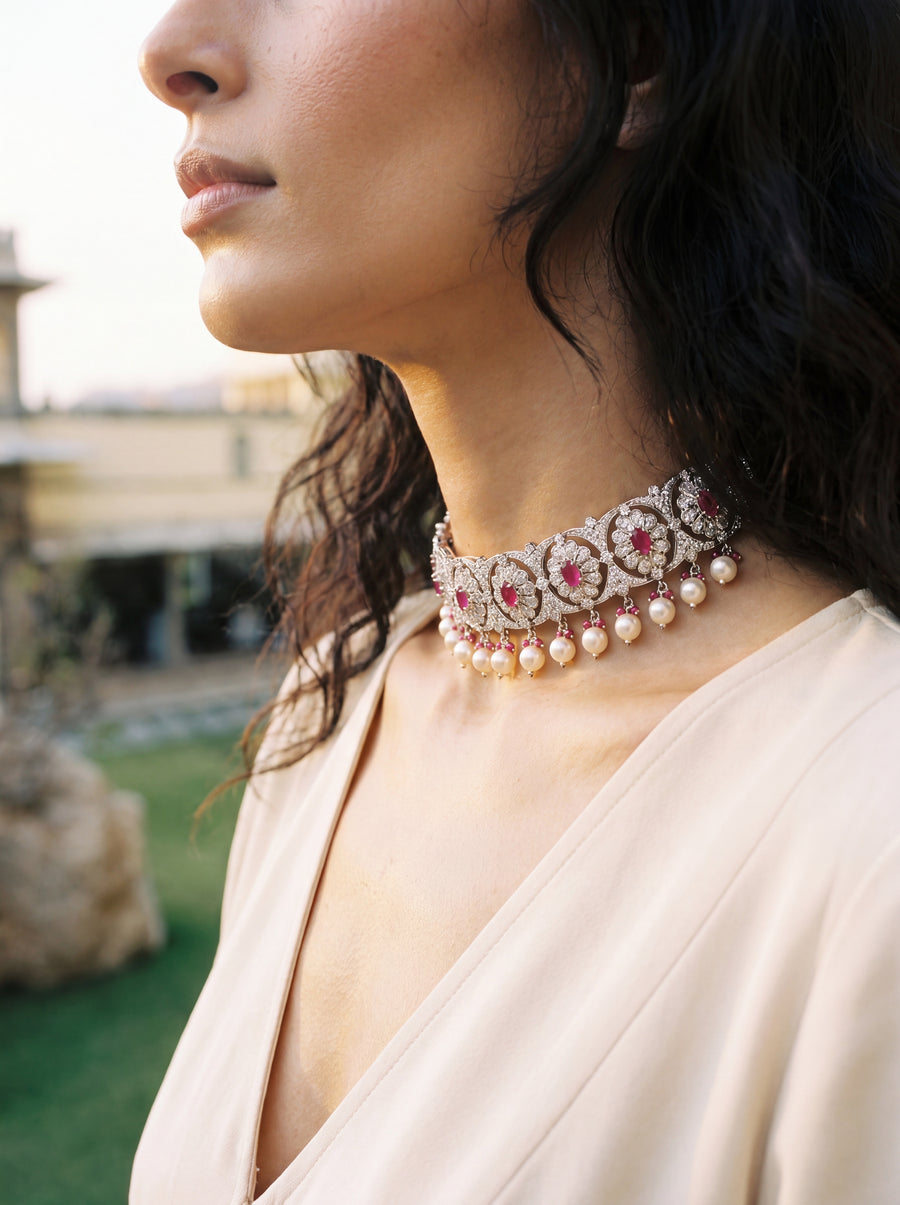 925 silver choker with a CZ floral lattice, ruby centres, and pearl drop fringe