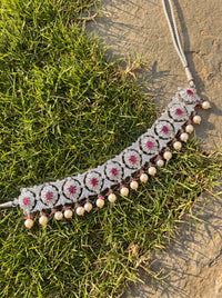 925 silver choker with a CZ floral lattice, ruby centres, and pearl drop fringe