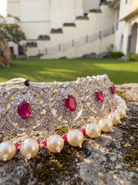 925 silver choker with a CZ floral lattice, ruby centres, and pearl drop fringe