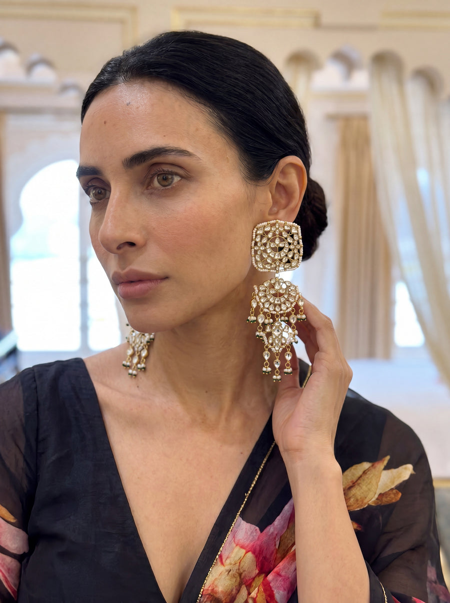 Kundan three-tier chandelier earrings with a mandala disc and pearl-emerald drops