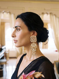 Kundan three-tier chandelier earrings with a mandala disc and pearl-emerald drops