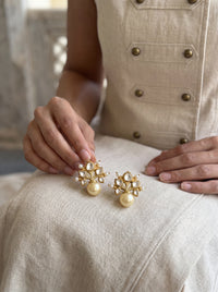 Moissanite Kundan stud earrings with a lustrous pearl drop