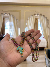 Turquoise fish pendant on a multicolour semi-precious bead strand