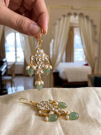 Kundan Polki fish-motif drop earrings with carved jade and pearl drops