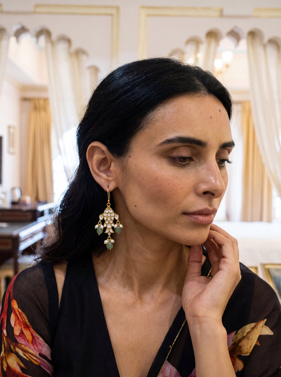 Kundan Polki fish-motif drop earrings with carved jade and pearl drops