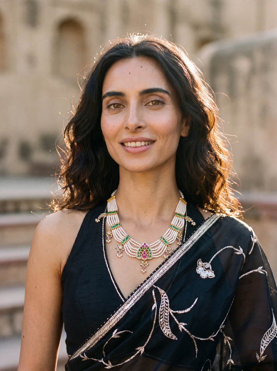 Jadau Kundan haar with six pearl strands and a ruby-emerald pendant