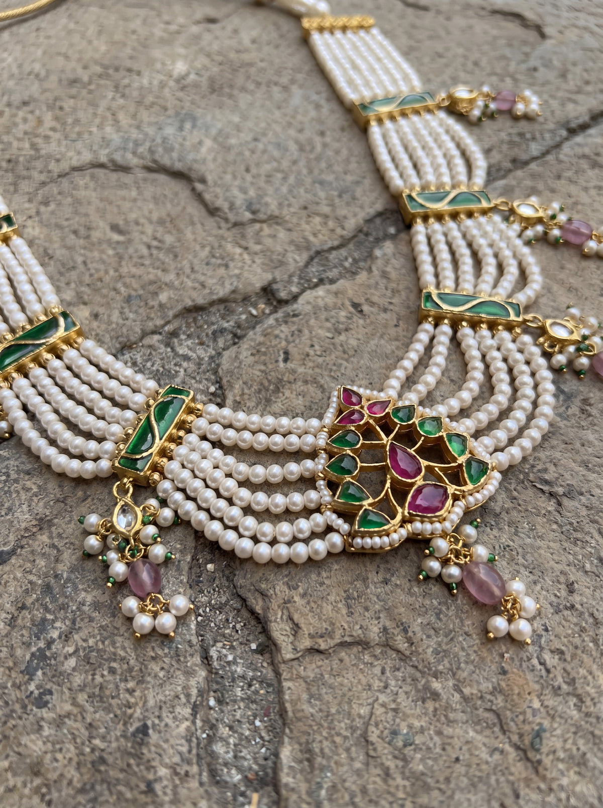 Jadau Kundan haar with six pearl strands and a ruby-emerald pendant