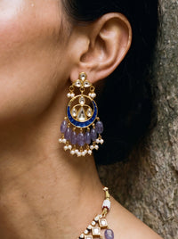 Jadau Kundan necklace set with a blue meenakari pendant and lavender beads