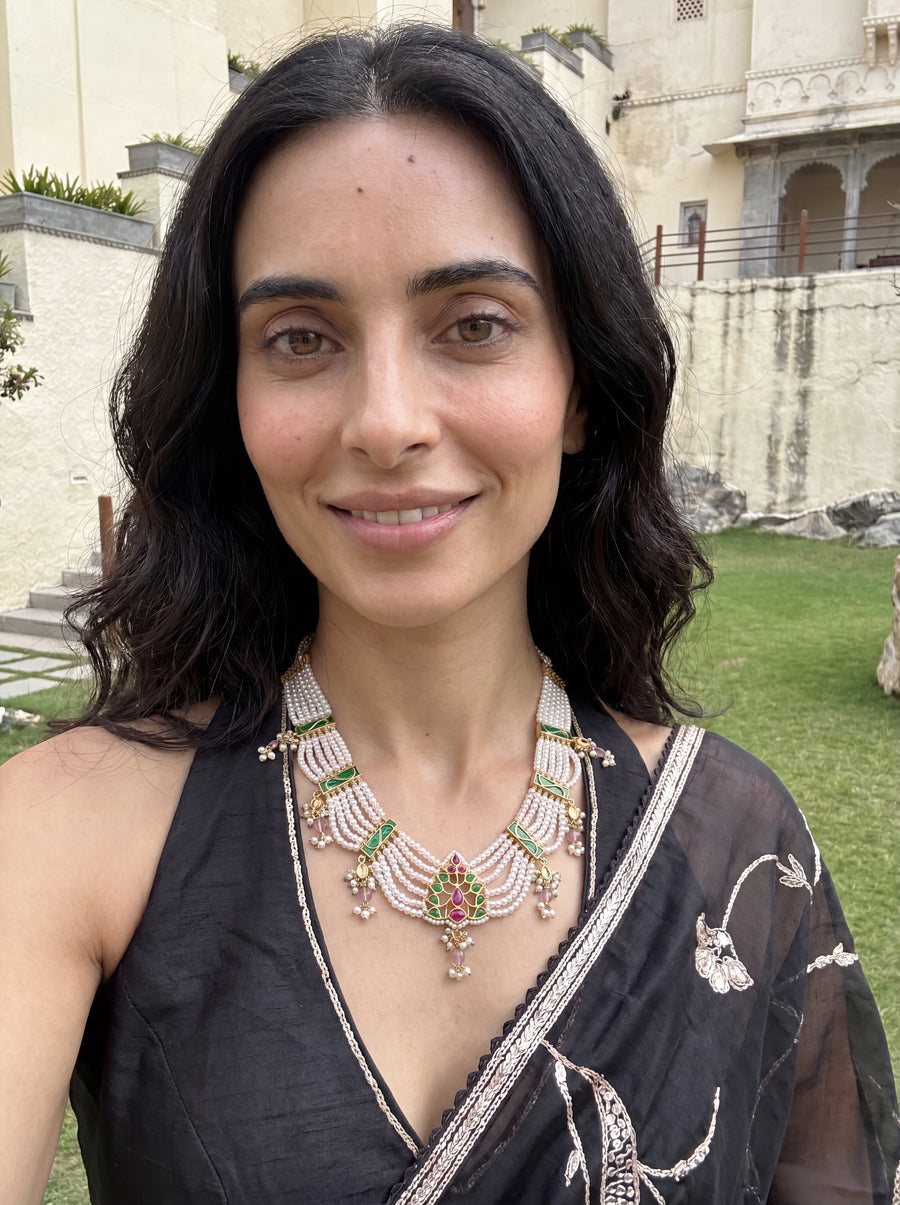 Jadau Kundan haar with six pearl strands and a ruby-emerald pendant