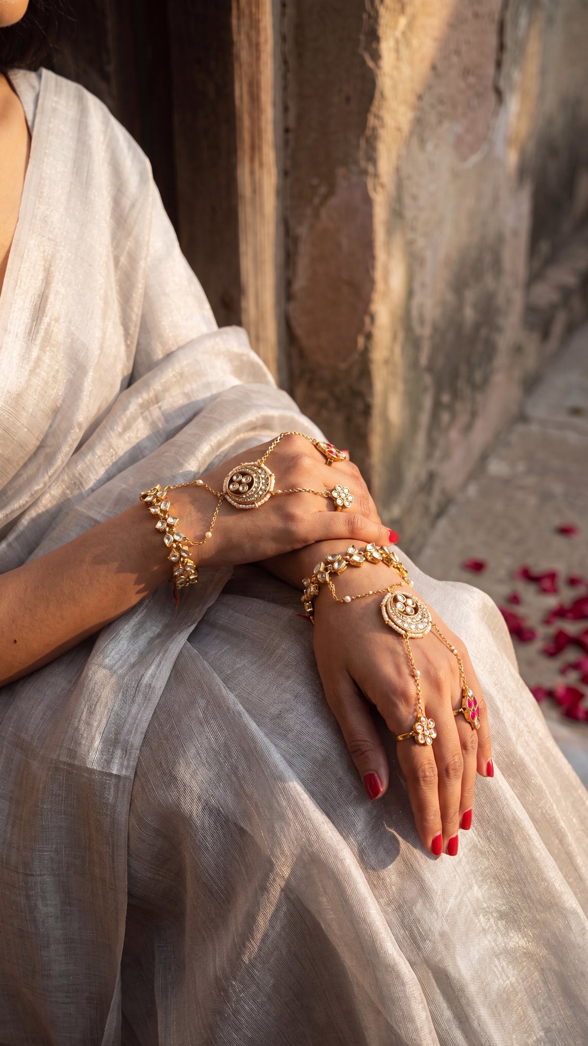 Jadau Kundan hathphool with a mandala centrepiece and pearl drops, sold as a pair