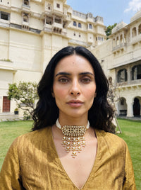 Kundan Polki timaniya choker with a teardrop fringe and pearl-strand ties