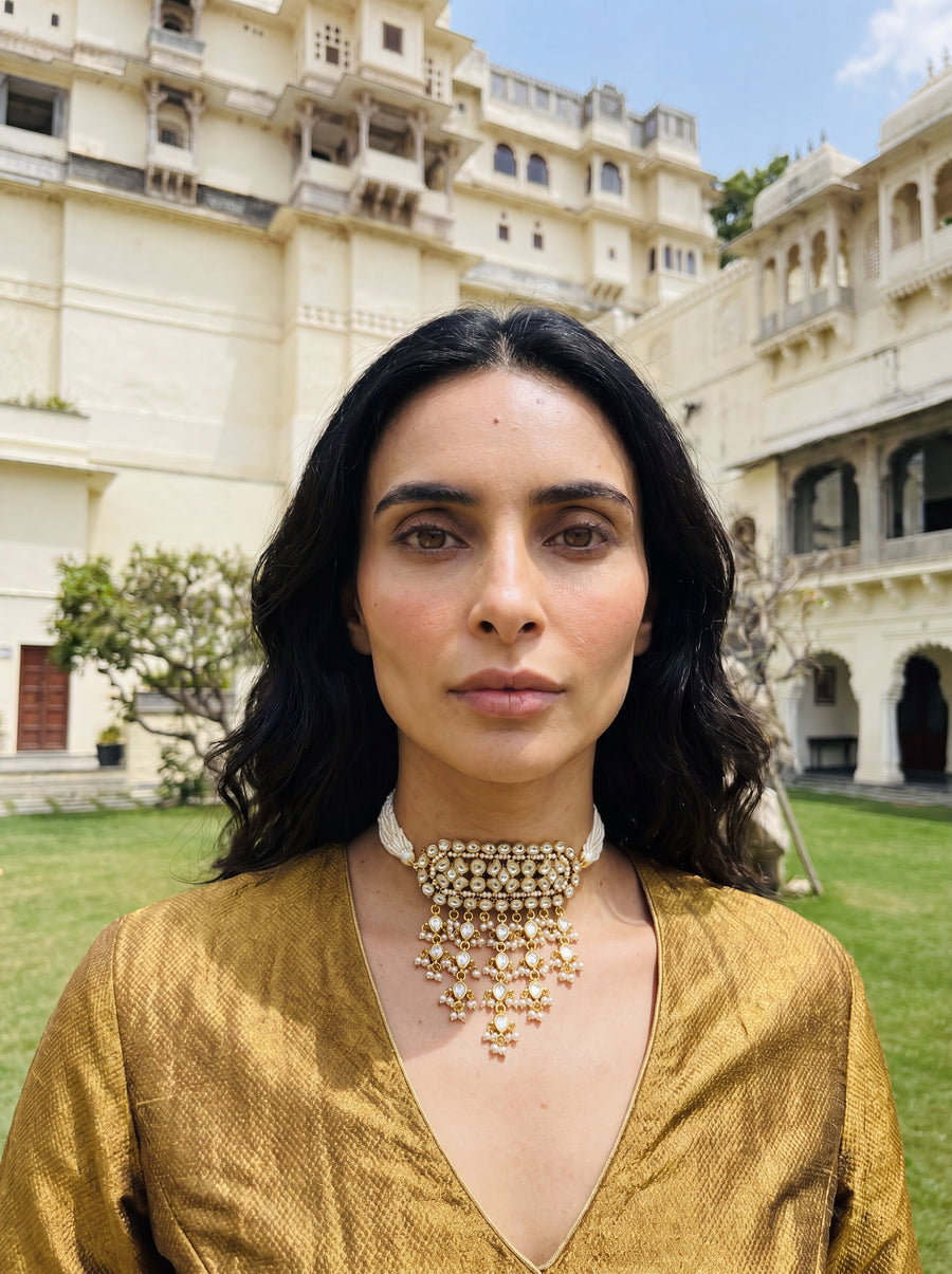 Kundan Polki timaniya choker with a teardrop fringe and pearl-strand ties