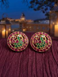 Kundan stud earrings with a ruby-emerald mosaic in a pomegranate flower design