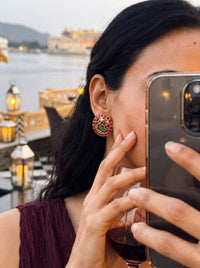 Kundan stud earrings with a ruby-emerald mosaic in a pomegranate flower design