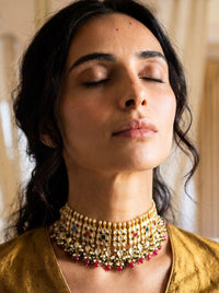 Kundan Polki choker set with all nine Navratna gemstones and a silk-tassel dori