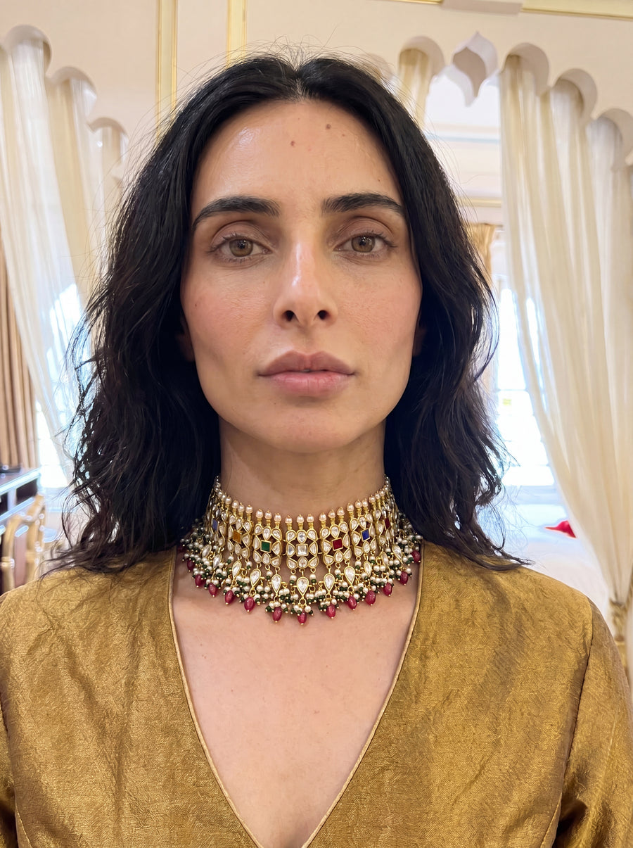 Kundan Polki choker set with all nine Navratna gemstones and a silk-tassel dori