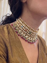 Kundan Polki choker set with all nine Navratna gemstones and a silk-tassel dori