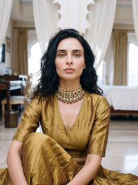 Kundan Polki choker set with all nine Navratna gemstones and a silk-tassel dori
