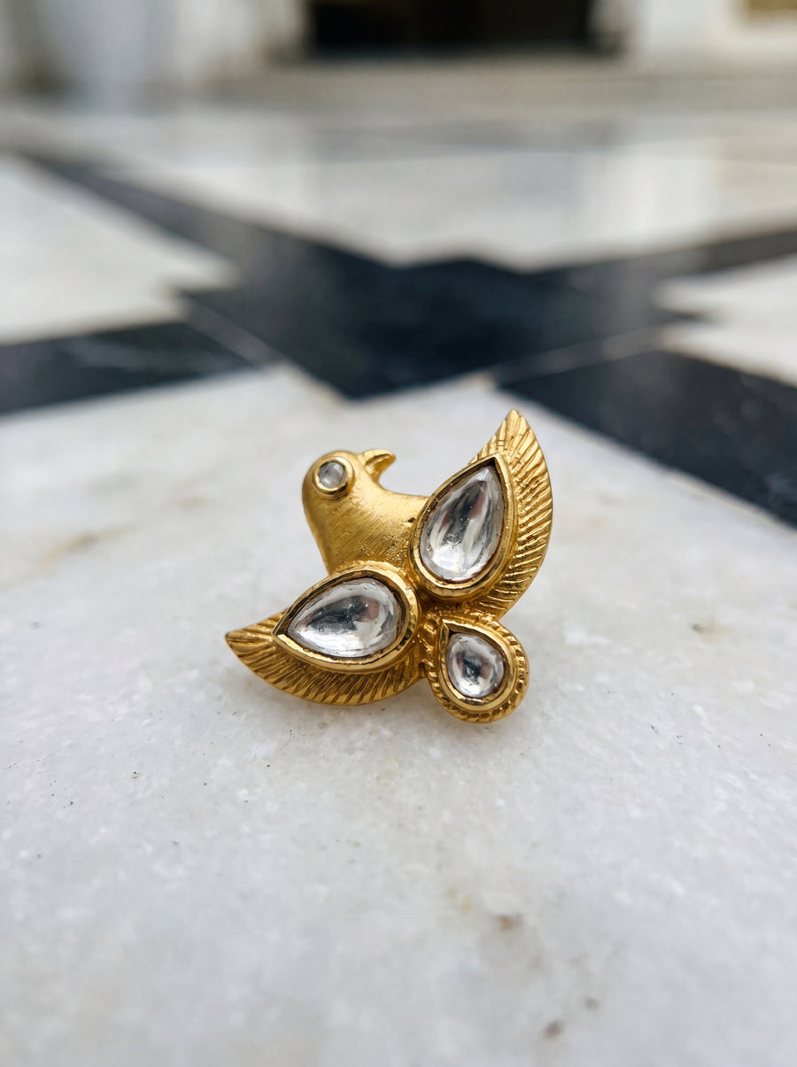 Jadau Kundan falcon pendant on a gold snake chain