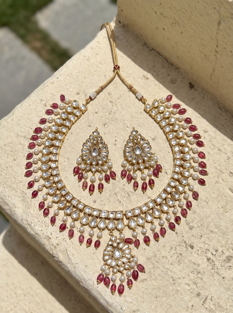 Jadau Kundan collar necklace with ruby and pearl drops, matching earrings