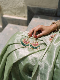 Jadau Kundan chandbali earrings with a ruby lotus stud and emerald-pearl fringe