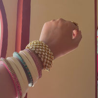 Jadau Kundan bridal cuff bracelet with marquise stones set edge to edge and a silk tassel closure