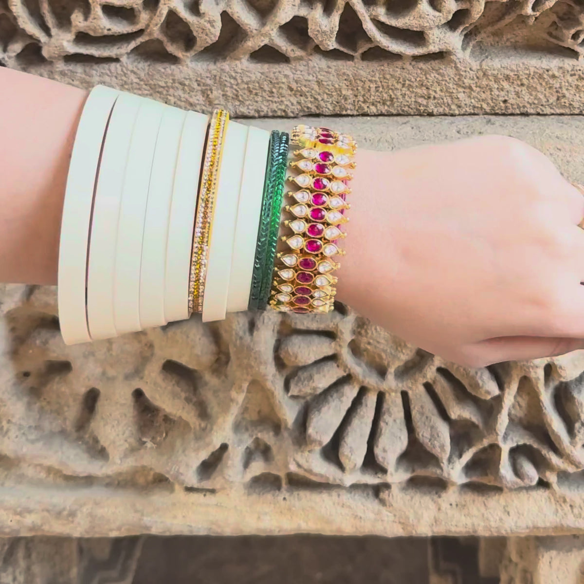 Jadau Kundan bangle with ruby ovals and polki teardrops on a gold-plated band