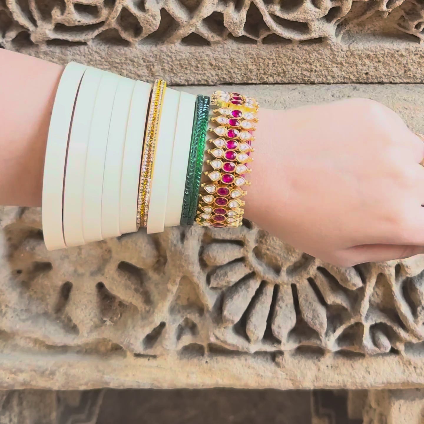 Jadau Kundan bangle with ruby ovals and polki teardrops on a gold-plated band