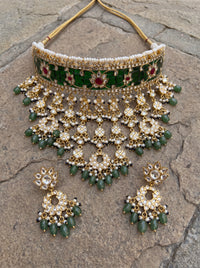 Jadau Kundan Aad choker set with semi-precious ruby or emerald stones