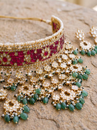 Jadau Kundan Aad choker set with semi-precious ruby or emerald stones