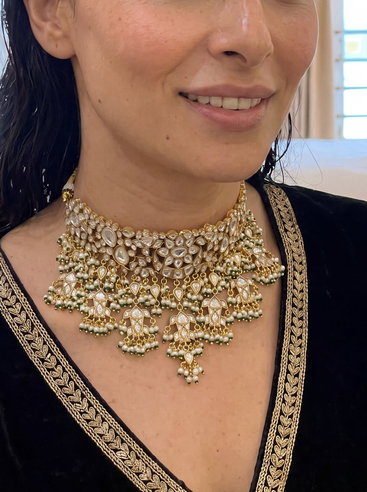 Kundan Polki choker with a dramatic jhumki and jade-pearl fringe