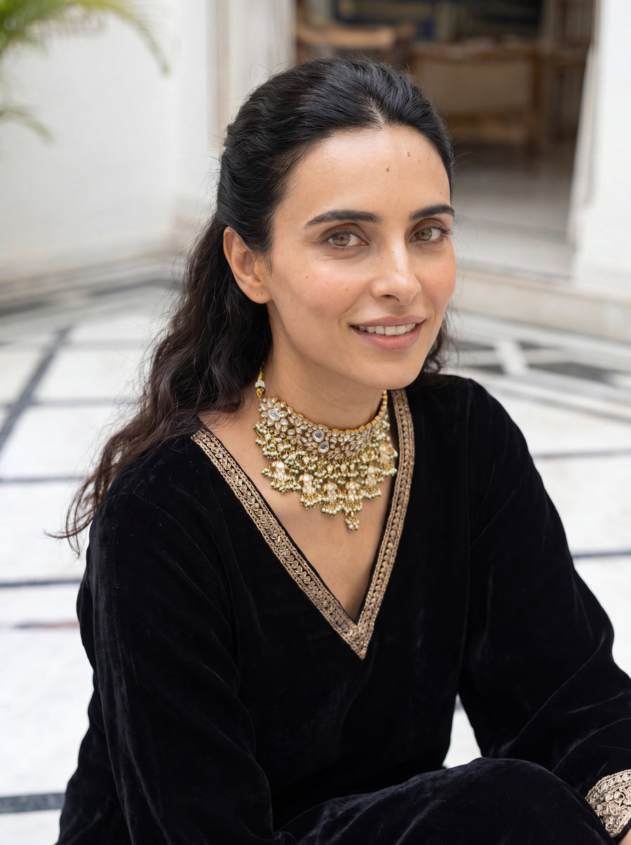 Kundan Polki choker with a dramatic jhumki and jade-pearl fringe