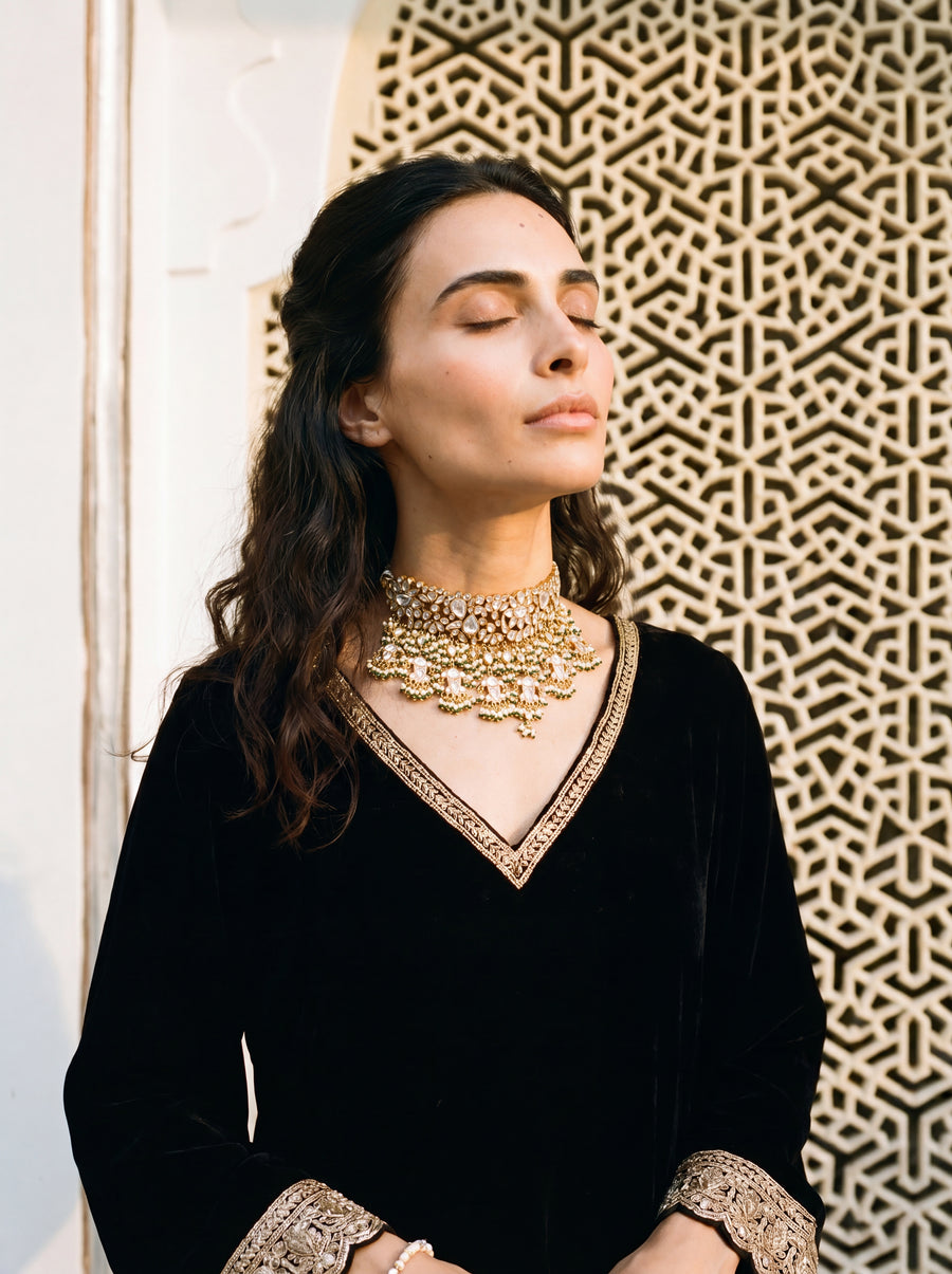 Kundan Polki choker with a dramatic jhumki and jade-pearl fringe