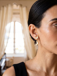 Handcrafted gold-plated Kundan drop earrings with a parrot and crescent moon motif