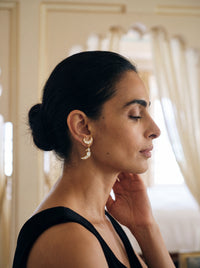 Handcrafted gold-plated Kundan drop earrings with a parrot and crescent moon motif
