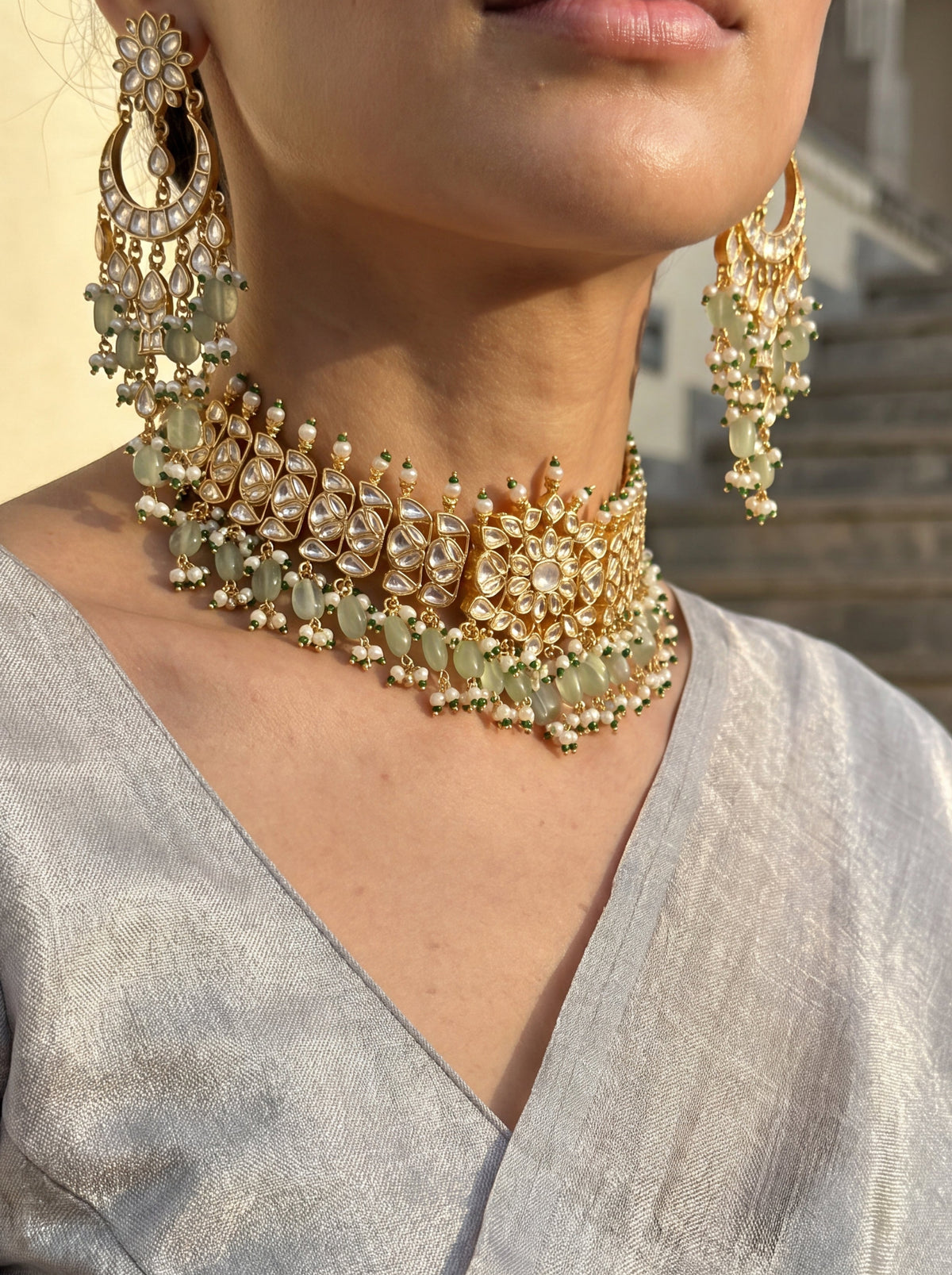 Jadau Kundan choker with floral motifs and jade-pearl drops