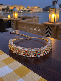 Kundan choker on translucent crystal panels with ruby-turquoise flowers