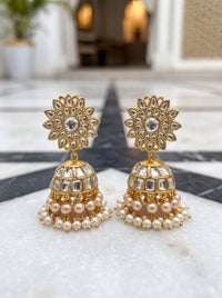 Kundan Polki jhumka earrings with a sunflower top and pearl fringe