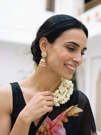 Kundan Polki jhumka earrings with a sunflower top and pearl fringe